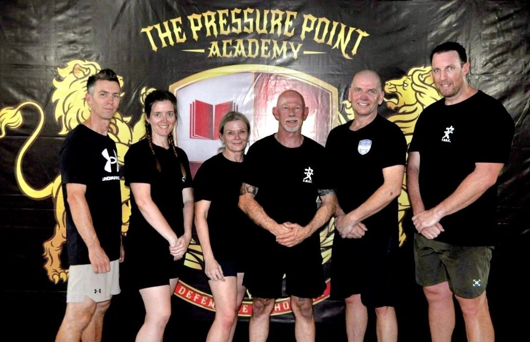 Craig Burman with colleagues at the Pressure Point Academy